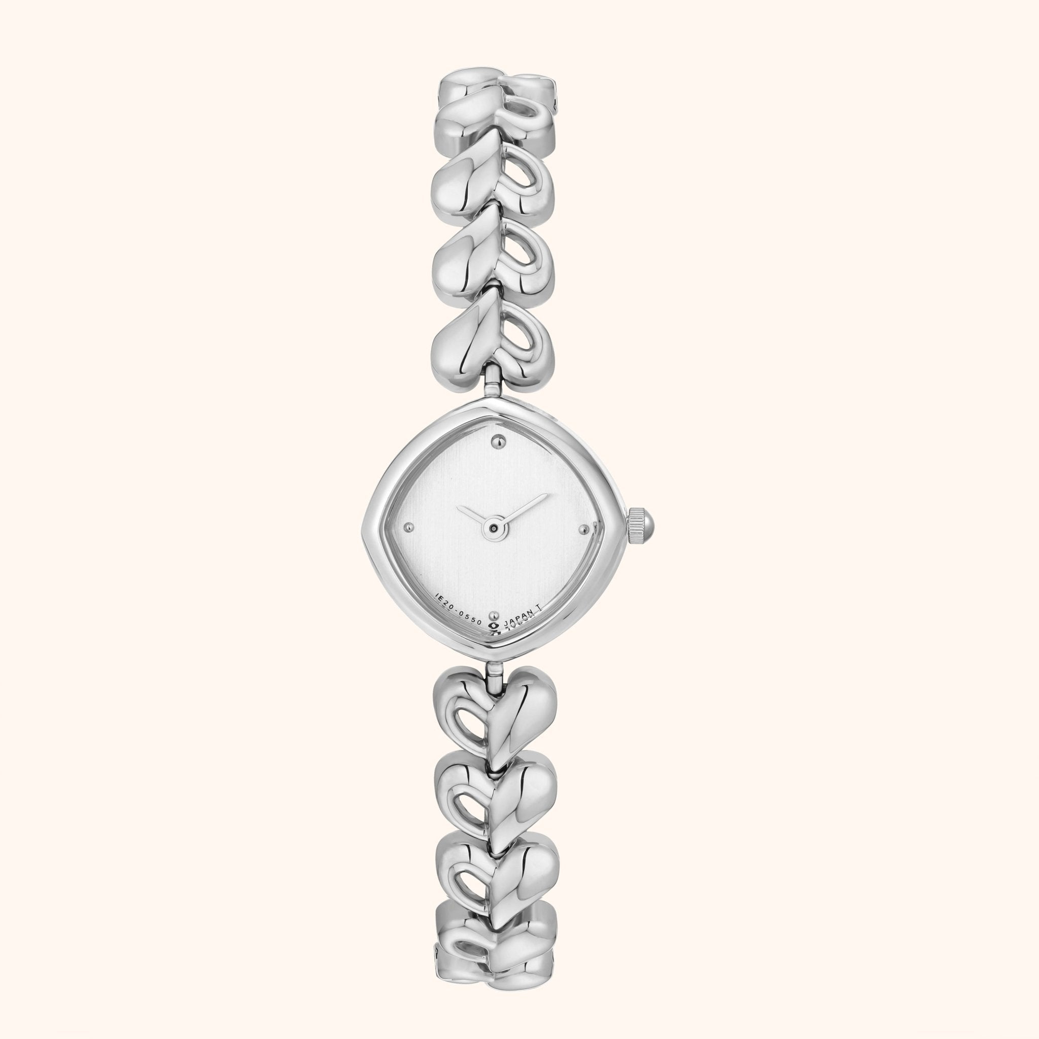 Silver watch with a decorative band on a white background