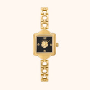 A gold-tone stainless steel Lila watch with a black gold dial and a bracelet of the same metal.