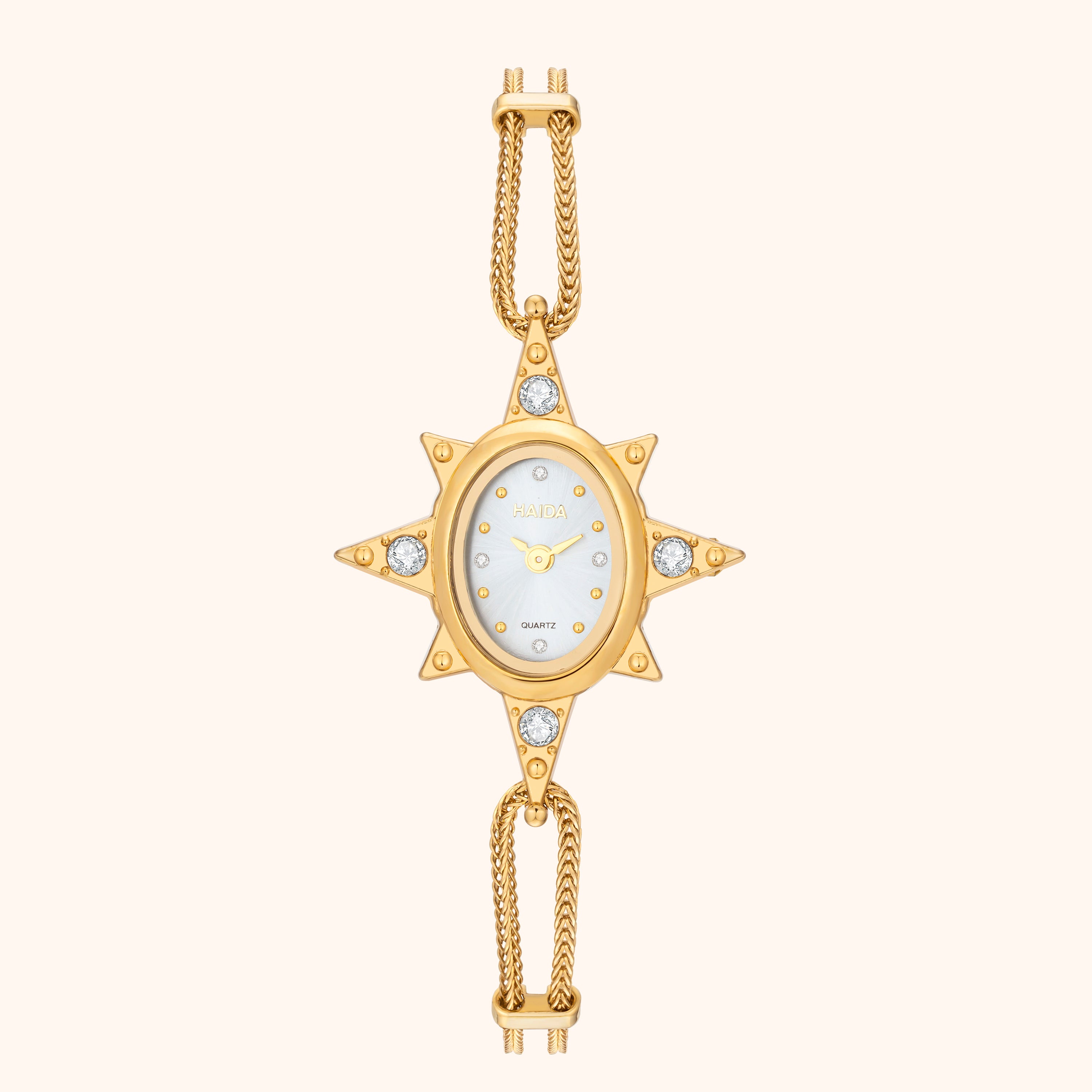 Gold star-shaped pendant with a chain on a white background